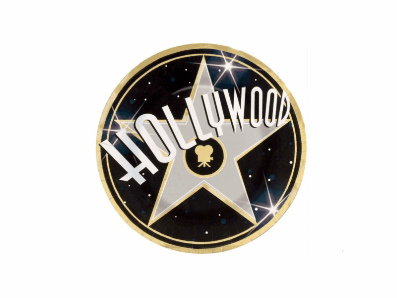 A round pin with a Hollywood star and moon design.